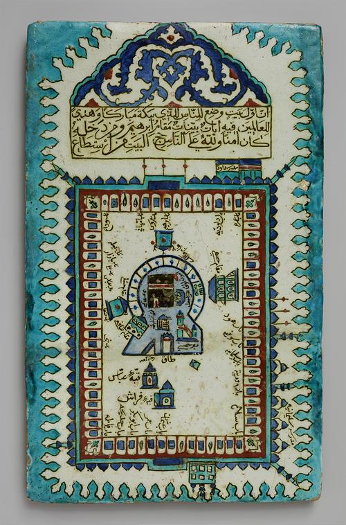 This rectangular tile depicts a stylized birds-eye view of the Ka‘ba in Mecca, view of the Holy Mosque with the black cubicle of the Ka‘ba in the centre follows an artistic tradition known from works on paper.