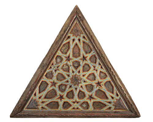Third of three, wooden Equilateral triangular forms,  featuring beams forming radiating multi pointed stars, painted with a floral designs, the beams painted bright red, yellow and light blue, moulded unpainted frame.