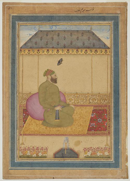 Painting of a garden pavilion, with a single solitary figure sitting in the middle, the pavilion has rich brocades, double carpets, and intricate patterns surround Bairam, who is joined by a large butterfly.