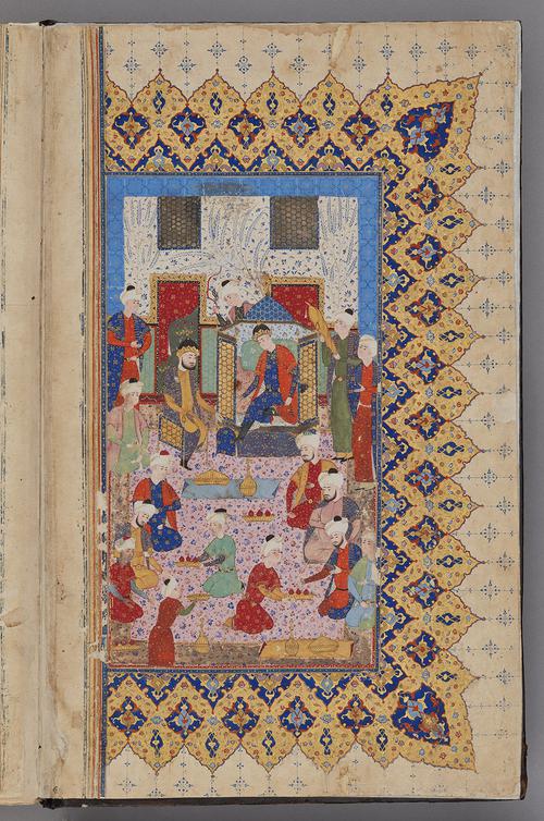  A young enthroned prince oversees a palace banquet, accompanied by a bearded wazir seated beside him.   