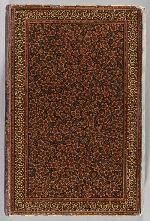 Back cover of lacquered binding with central black and orange floral designs and illuminated florals and scroll frame.